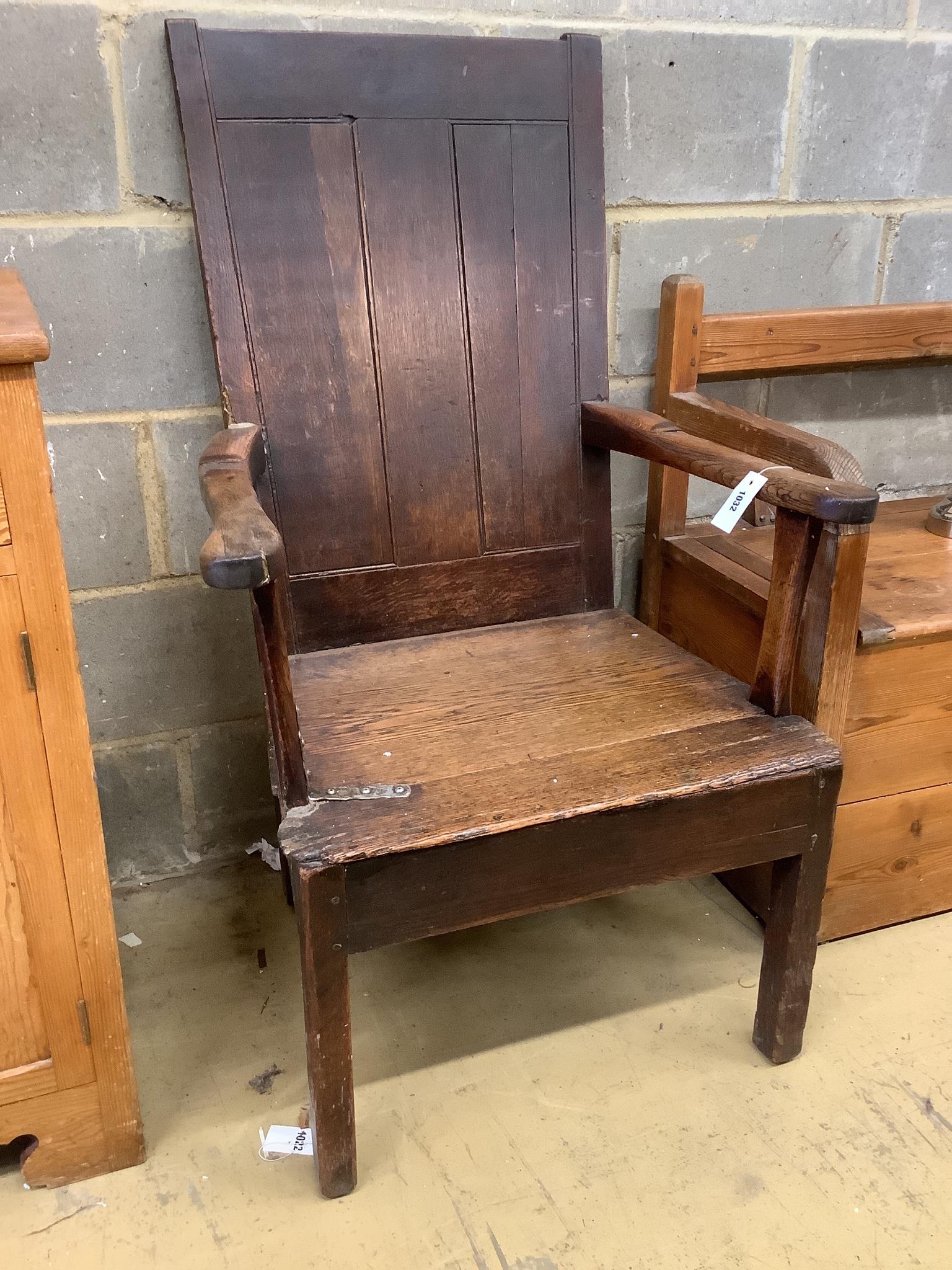 An early 18th century oak elbow chair